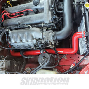 SkidNation premium coolant reroute installed